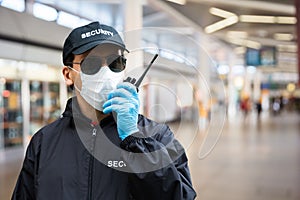 Security Guard Standing In Face Mask