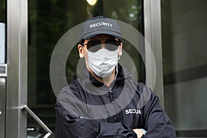 Security Guard Standing In Face Mask