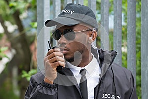 Security Guard Using Walkie-Talkie