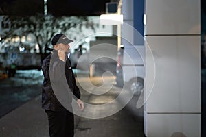 Security Guard Walking Building Perimeter