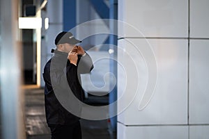 Security Guard Walking Building Perimeter