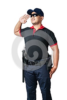 A security guard wearing black glasses, wearing a cap, salutes, has rubber batons and handcuffs on his tactical belt. isolated