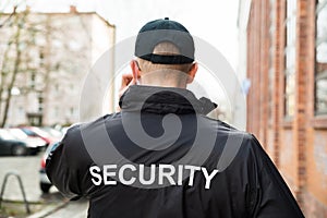 Security Guard Wearing Jacket photo