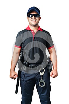 Security guards wearing black glasses and hats The smiling stand has a rubber baton ready and handcuffs on the tactical belt. on a