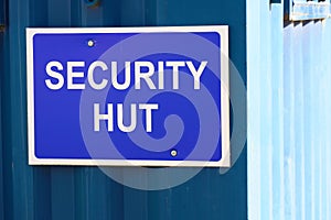 Security hut sign at construction site entrance