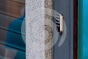 A security lock on an gate with a touch panel for access by an access code key