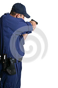 Security Officer aiming a gun