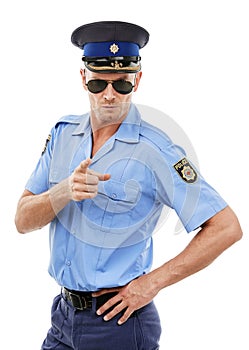 Security, officer and portrait of police point on white background for authority, public safety and crime. Justice, law