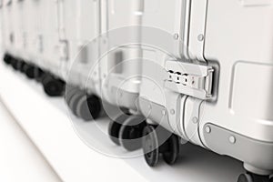 Security pad lock of silver metal luggage in the luggage row. Se