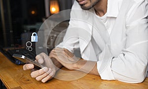 Security protection data alert with man using mobile phone with password lock