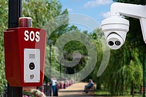 Security system in public parks. SOS, police, emergency button and security camera in a public park