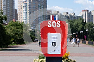 Security system in public parks. SOS, police, emergency button and security camera in a public park