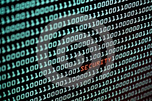 Security text and binary code concept from the desktop screen, selective focus