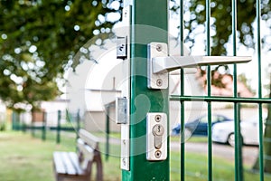 The secutity locks in an iron fences
