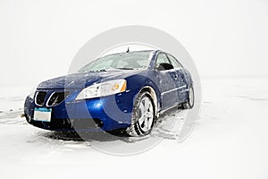 Sedan Parked on Ice sheet.