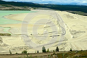 Sediment on the edge of a tailings pond at a copper mine near Ashcroft, British Columbia, Canada