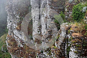 Sedimentary clifftop, in the fog