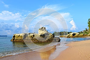 Sedimentary Lime Stone Rock in Calm Sea Water, Blue Sky with White Clouds, and Sandy Beach - Landscape at Sitapur, Neil Island