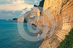 Sedimentary Rock Cliff at the sea, Limestone Natural Structure Coast, Mointain Chain of Layered Stone Formation along the Beach, H