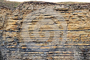 Sedimentary rocks in layers-stratum, strata. Geology. photo