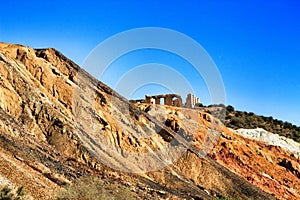 Sediments, rock formations and mineral streaks in an old abandoned quarry