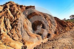 Sediments, rock formations and mineral streaks in an old abandoned quarry