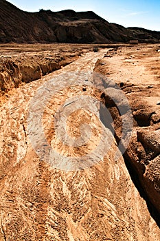 Sediments, rock formations and mineral streaks in an old abandoned quarry