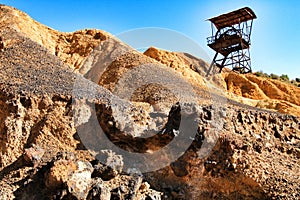 Sediments, rock formations and mineral streaks in an old abandoned quarry