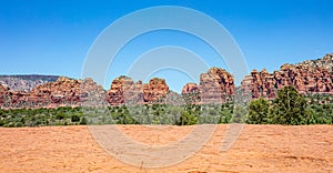 Sedona Arizona USA panorama. Red orange color rock formations, blue sky, sunny spring day