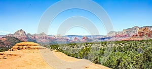 Sedona Arizona USA panorama. Red orange color rock formations, blue sky, sunny spring day