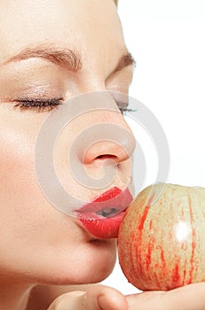Seductive woman with an apple
