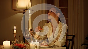 Seductive woman waiting at romantic dinner closeup. Sexy lady sitting alone