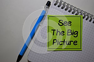 See The Big Picture write on sticky note isolated on Office Desk