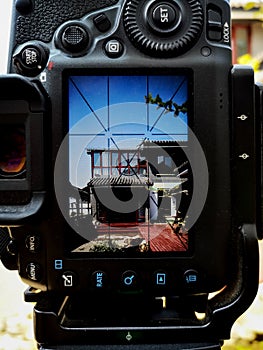 See the Chinese building being photographed through the camera screen