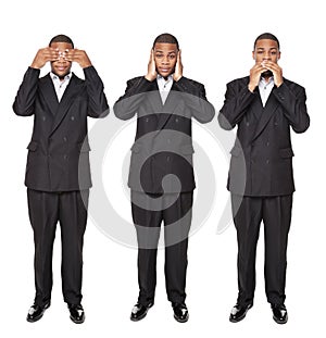 See No Evil poses - African American businessman