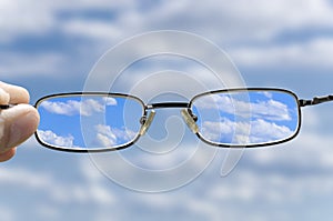 See the sky through glasses photo