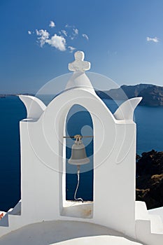 See view through church arch bell Santorini Greece