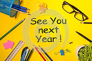 See you next year - memo at yellow office table. 2019 new year coming