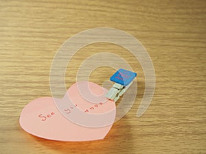 See you on sticky note, heart shape with created paper clip