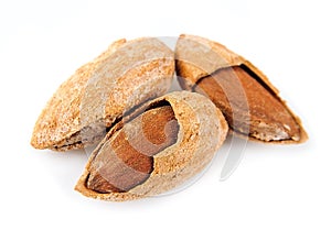 Seed of almonds nuts on white