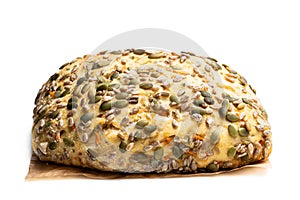 Seed covered carrot bread bloomer loaf isolated on a white