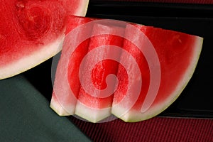 Seedless watermelon cut in wedges photo