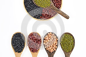 Seeds beansBlack Bean, Red Bean, Peanut and Mung Bean useful for health in wood spoons on white background