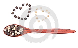 The seeds of black pepper, a heap, top view on a white background, close-up