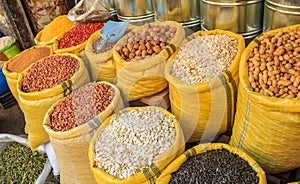 Seeds and nuts in canvas bags at the traditional souk market in
