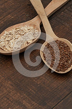 Seeds on a wooden spoon close up