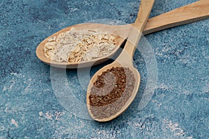 Seeds on a wooden spoon close up