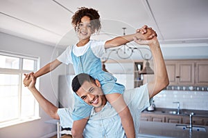 Seeing my kid happy is one of the best feelings ever. Portrait of a father carrying his little daughter on his shoulders