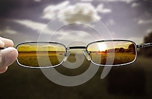 Seeing sunset through glasses