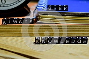 Always seek knowledge written on wooden blocks. Education and business concept